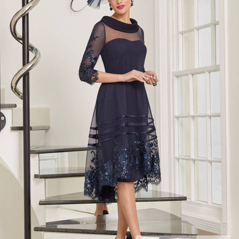 Elegant high-low dress with fold collar from EDKAY COLLECTION UK, featuring sleek black fabric and stylish design.