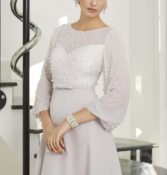 Pearl-embellished ball sleeves dress from EDKAY COLLECTION UK, stylish clothing with elegant pearl details on the sleeves.