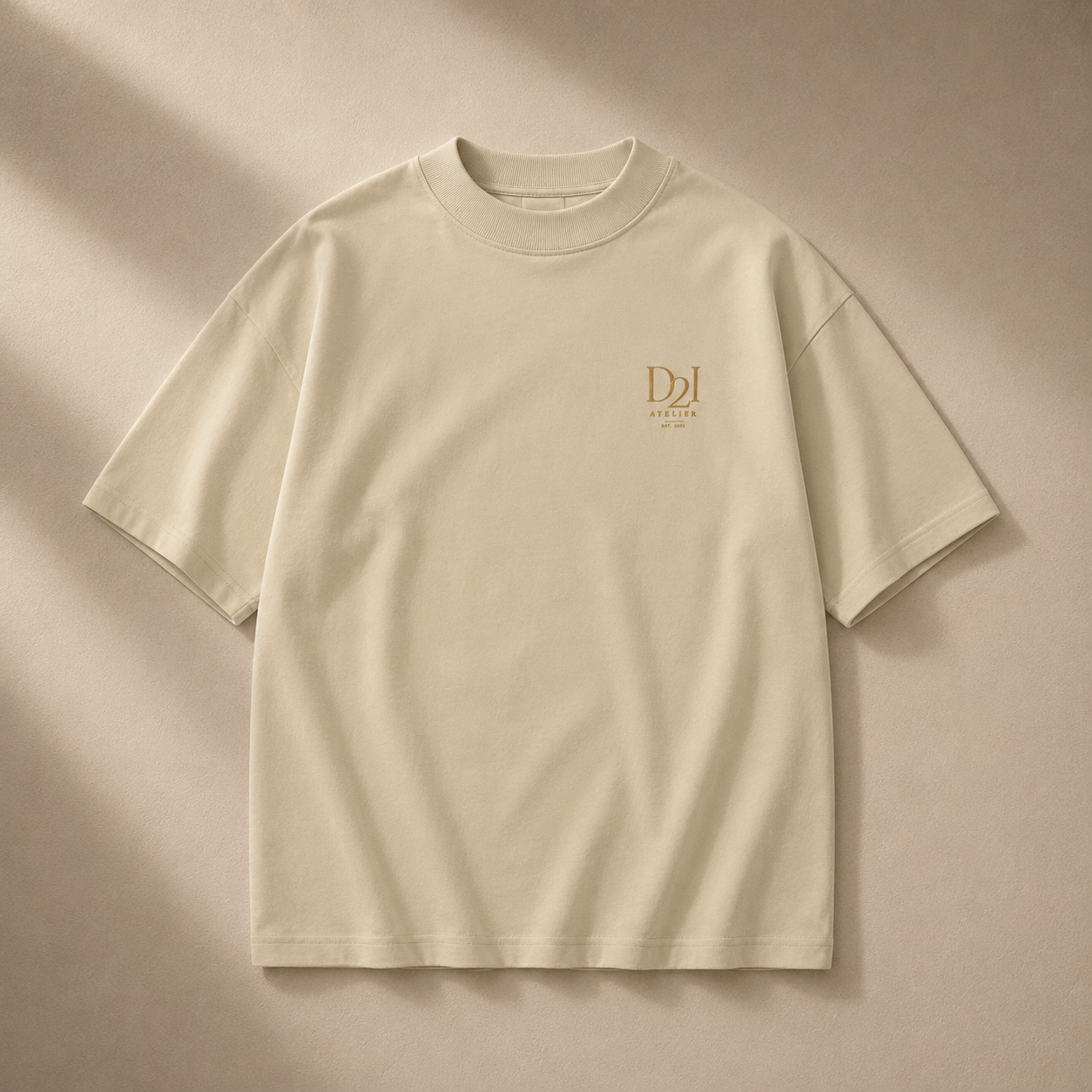 Beige oversized high-neck T-shirt from D2I Atelier by Dress 2 Impress Ltd, shown on a hanger with a relaxed fit.