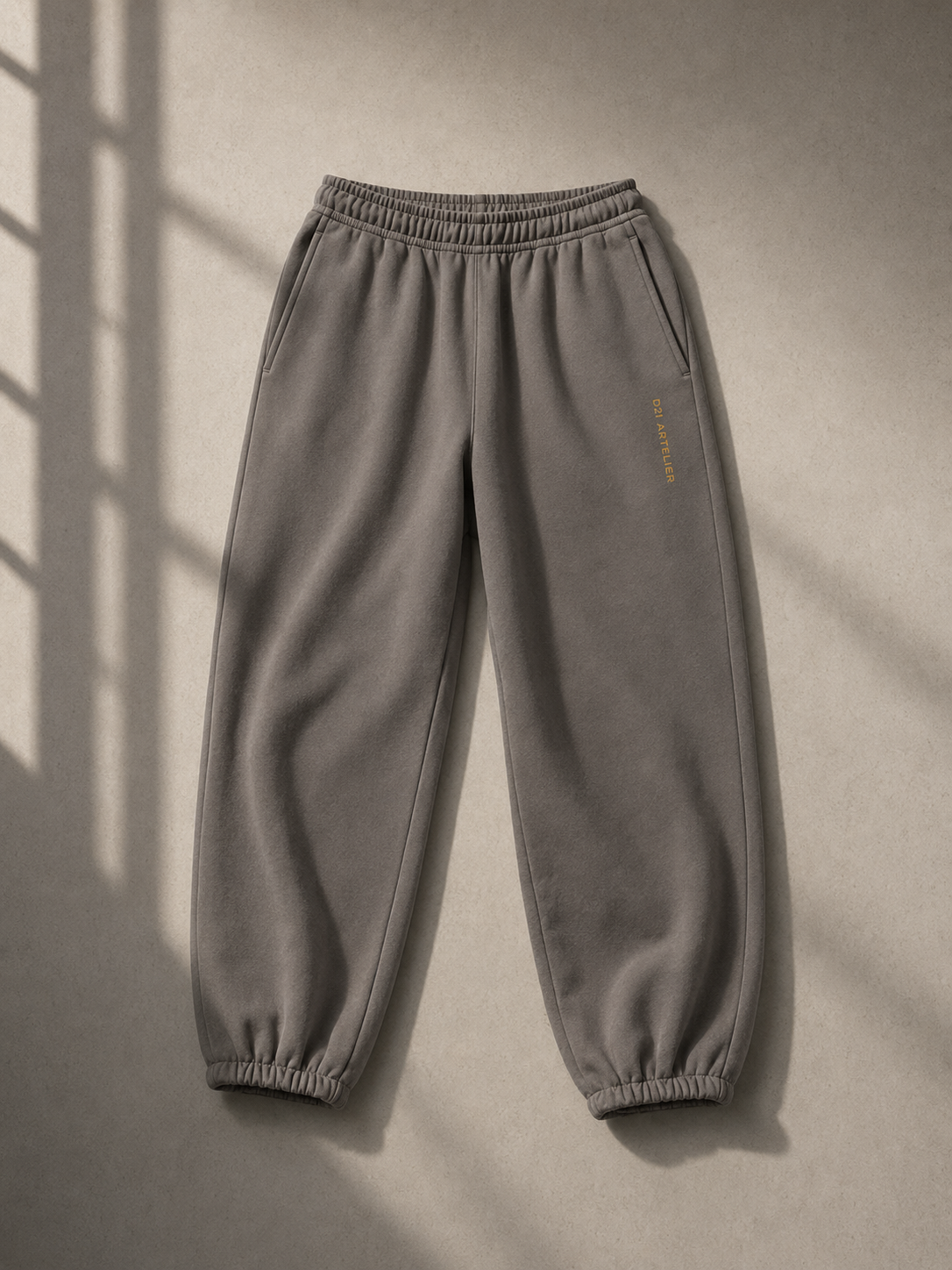 Men's D2I Artelier heavyweight fleece sweatpants from Dress 2 Impress Ltd, showing a relaxed fit and soft fleece fabric.