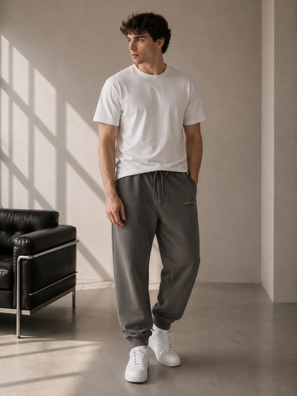 Vintage washed sweatpants by Dress 2 Impress Ltd featuring a relaxed fit and casual style, shown on a model.