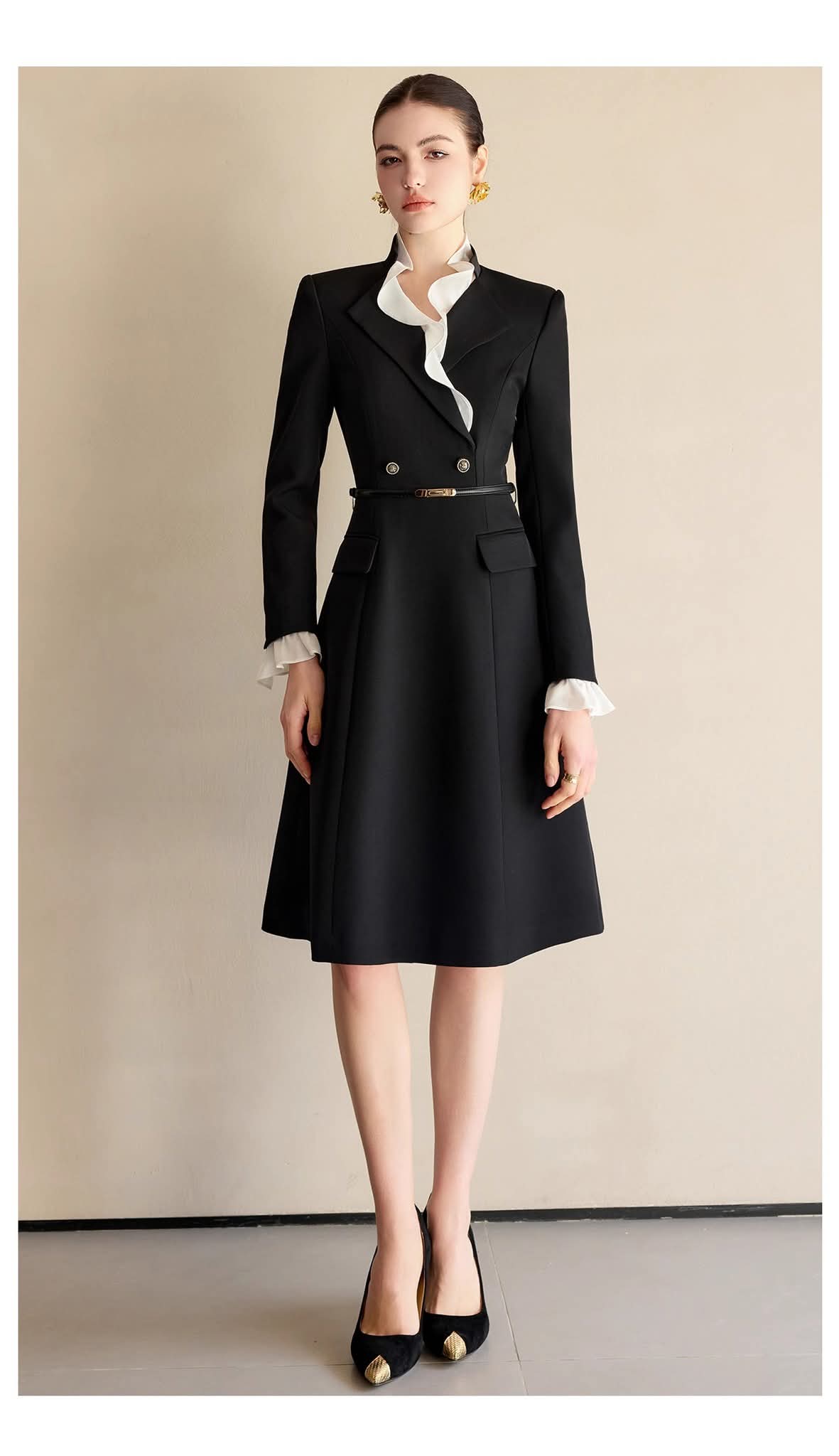 Black dress with contrast ruffle details from EDKAY COLLECTION UK, showcasing a stylish clothing design.