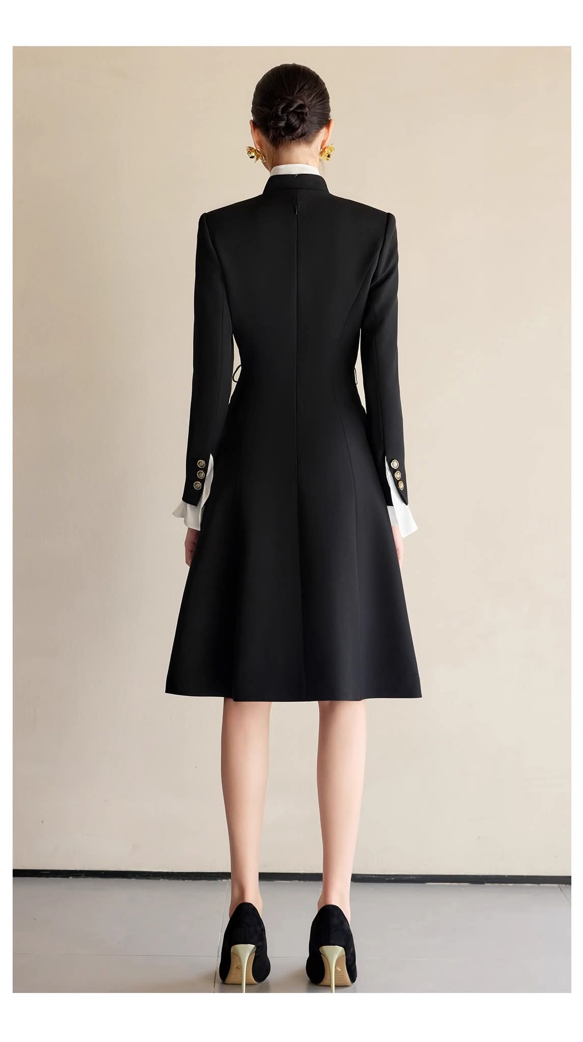 Black contrast-ruffle dress from EDKAY COLLECTION UK, featuring stylish ruffle details and a sleek, elegant silhouette.