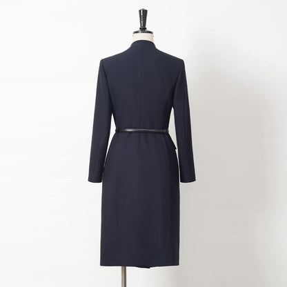 EDKAY COLLECTION UK Midnight Sovereign Wrap Dress displayed on a hanger, showcasing its elegant fabric and stylish design.