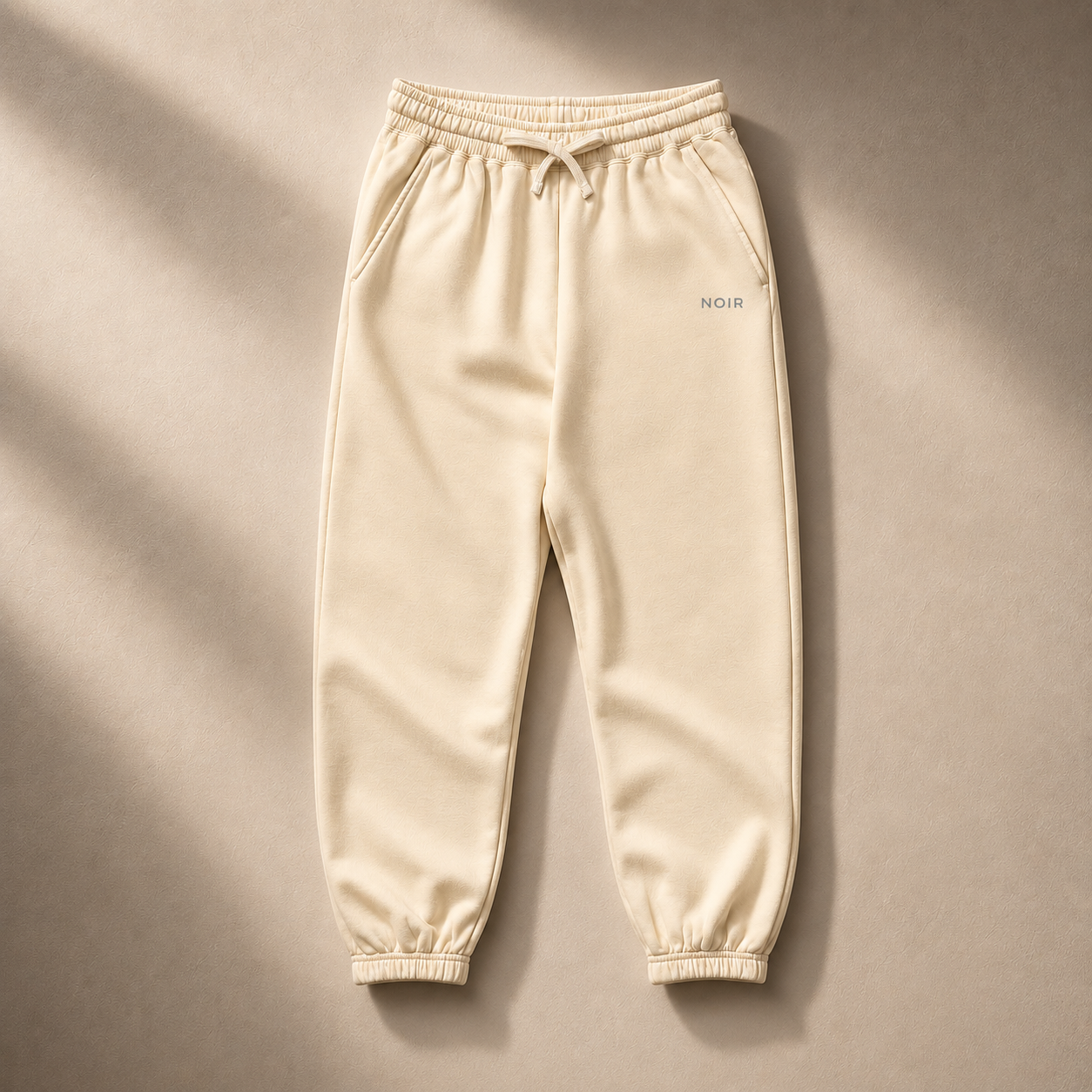 Ivory D2I Washed Fleece Sweatpants by Dress 2 Impress Ltd, showing a comfortable, heavy-weight fleece fabric and relaxed fit.