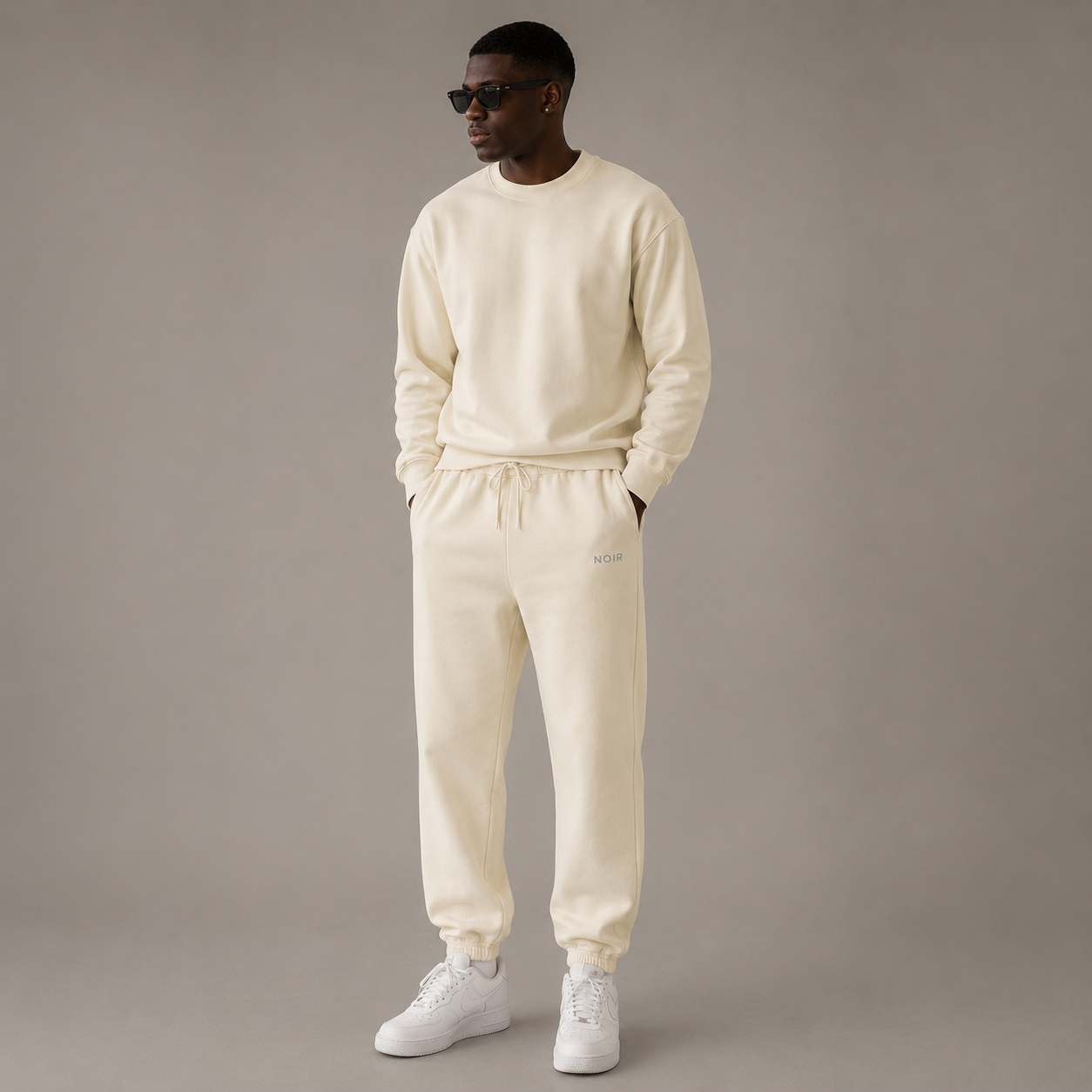 Ivory D2I Washed Fleece Sweatpants on a model, showing a relaxed fit and comfortable heavy-weight fabric.