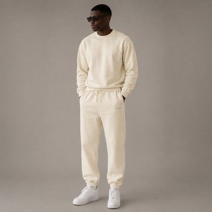 Ivory D2I Washed Fleece Sweatpants on a model, showing a relaxed fit and comfortable heavy-weight fabric.