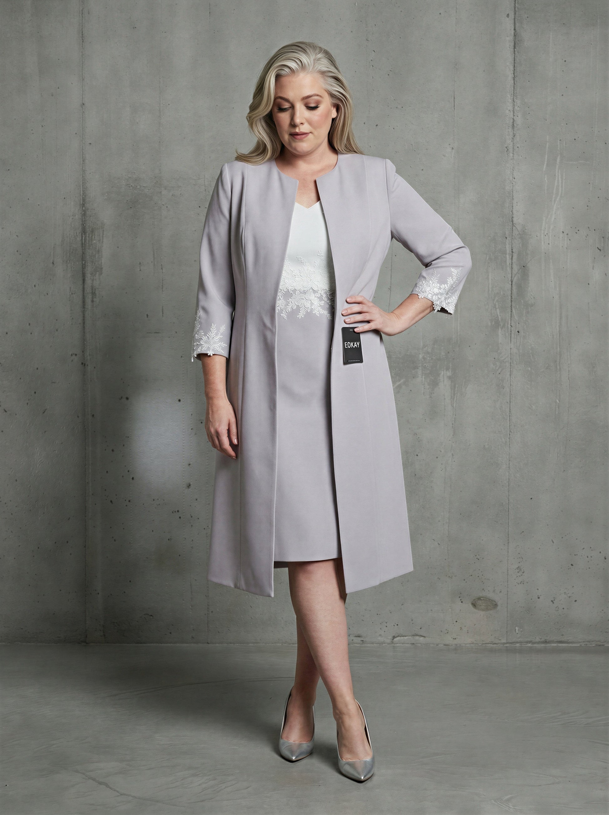 Grey and white 2-piece knee-length sheath bride dress suit by EDKAY COLLECTION UK, featuring elegant tailored design.