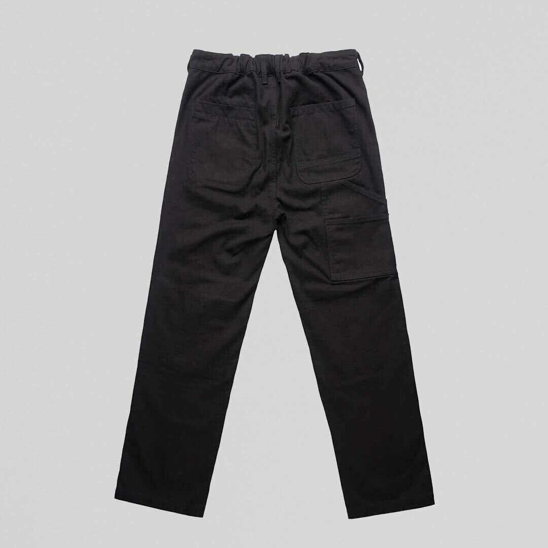 Black NU-VEL Everyday Trousers shown from the back, featuring a tailored fit and smooth fabric for casual or professional wear.