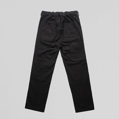 Black NU-VEL Everyday Trousers shown from the back, featuring a tailored fit and smooth fabric for casual or professional wear.