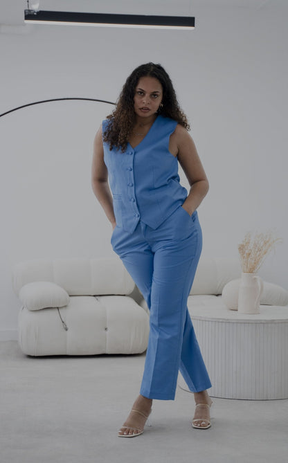 Elegant vivid blue 3-piece pantsuit from EDKAY COLLECTION UK, featuring a tailored blazer, matching trousers, and a stylish top.