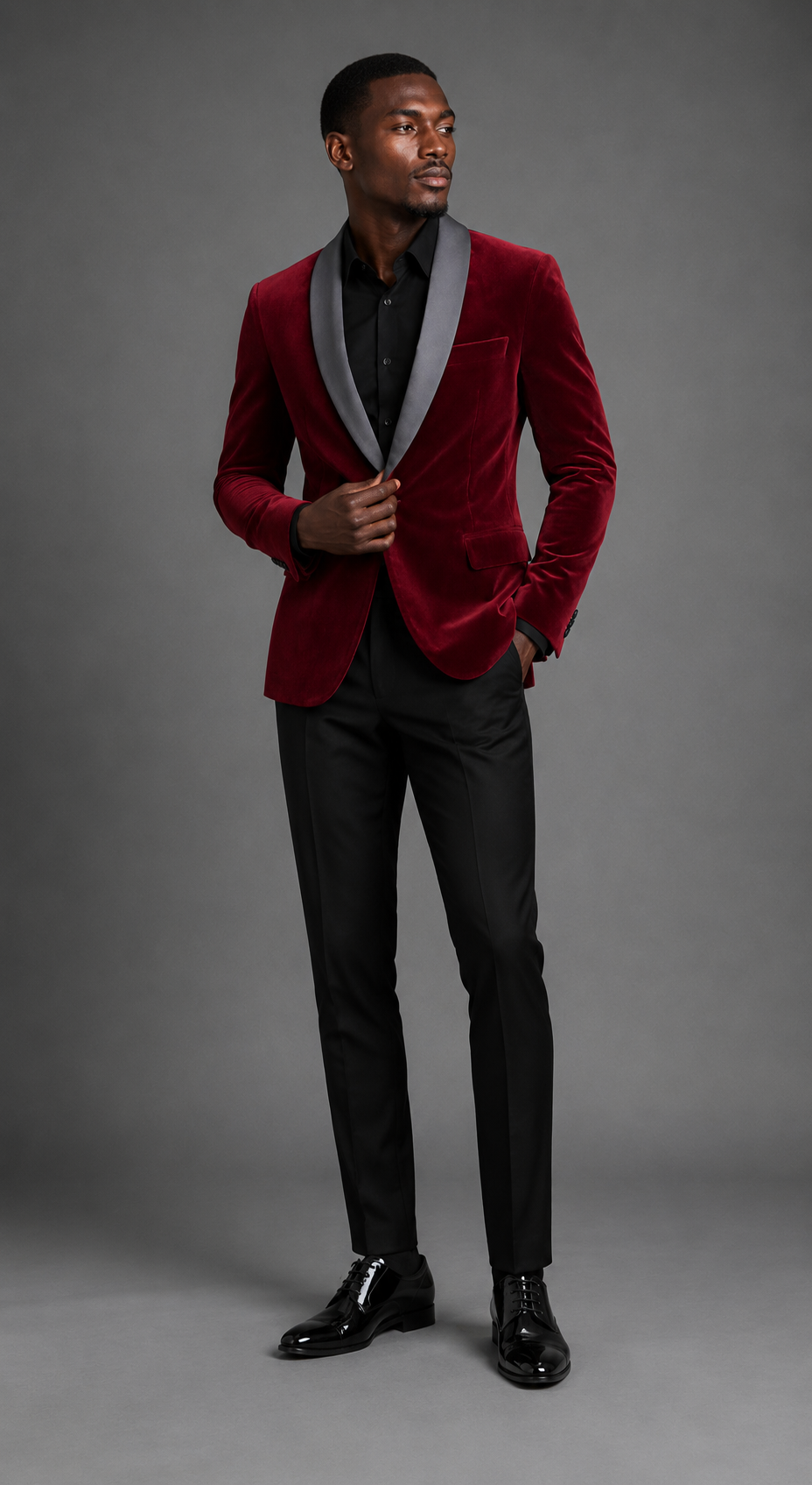 Men's velvet burgundy party suit by EDKAY COLLECTION UK, full portrait showing tailored blazer and matching trousers.
