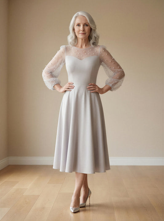 Pearl-embellished ball sleeves dress from EDKAY COLLECTION UK, featuring elegant fabric and stylish design.
