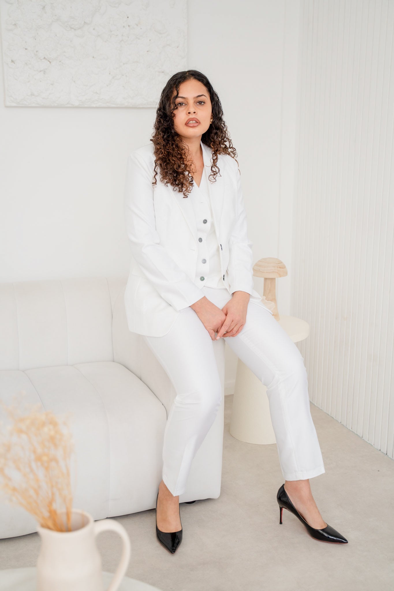 White satin 3-piece pantsuit from EDKAY COLLECTION UK featuring a tailored blazer, matching trousers, and a stylish top.