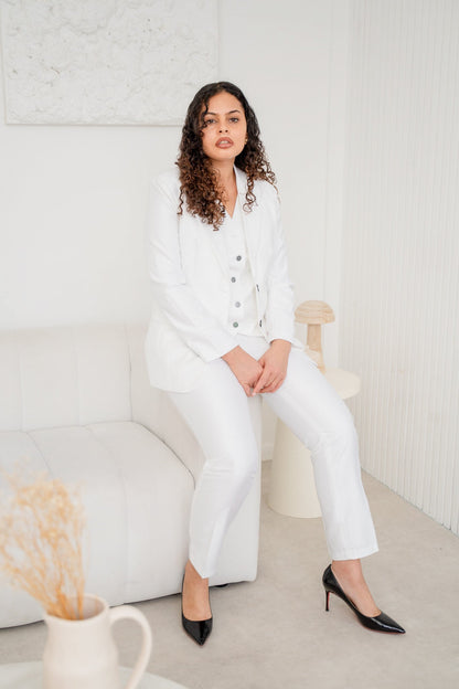 White satin 3-piece pantsuit from EDKAY COLLECTION UK featuring a tailored blazer, matching trousers, and a stylish top.