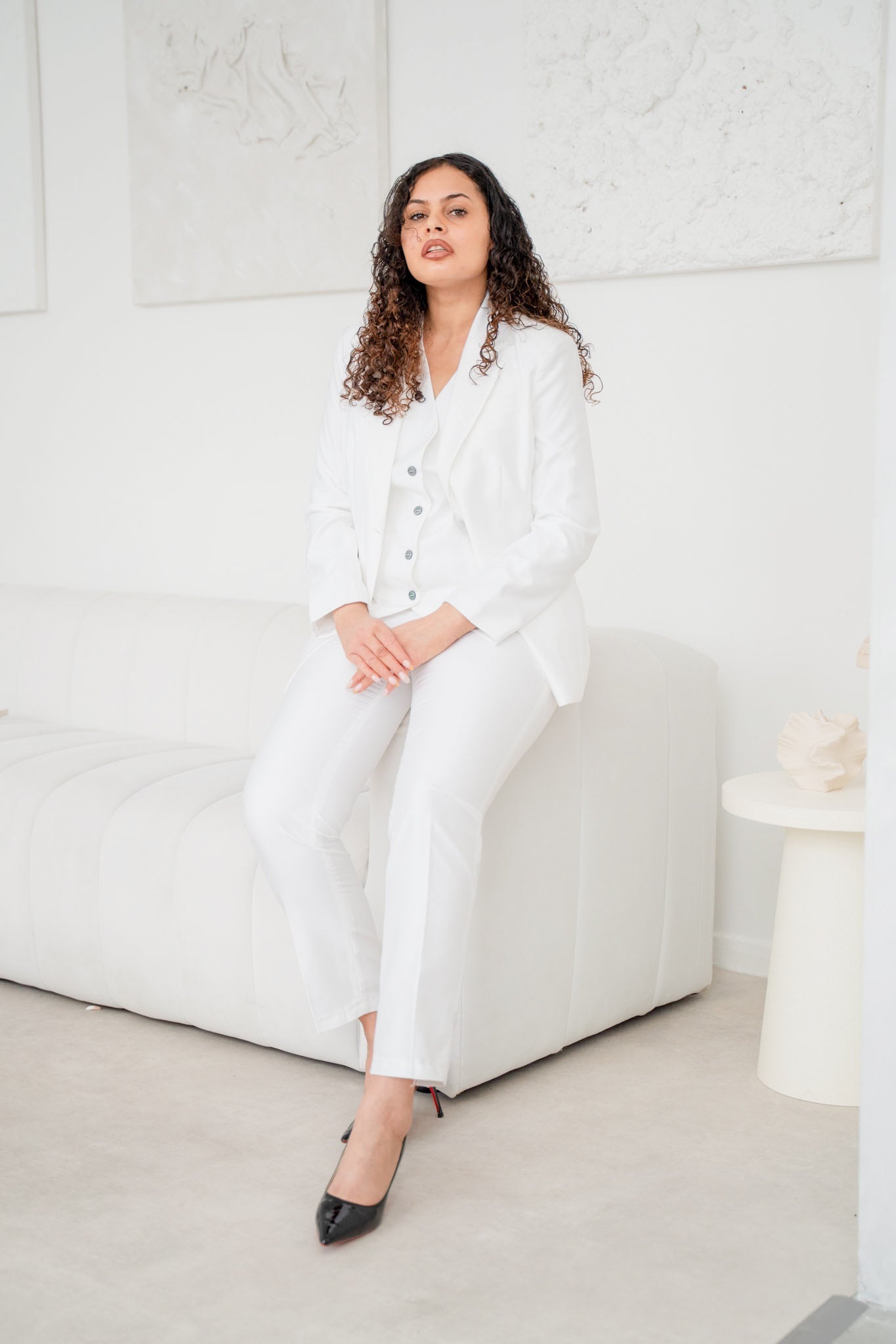 White satin 3-piece pantsuit from EDKAY COLLECTION UK featuring a tailored blazer, matching pants, and a stylish top.